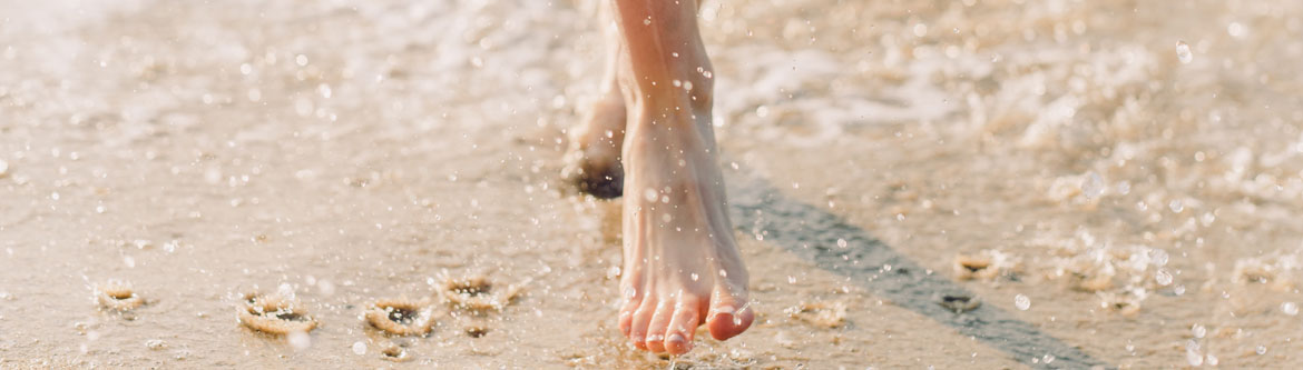 sinking sand walking on beach