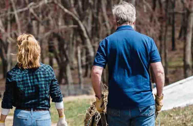 people walking in field