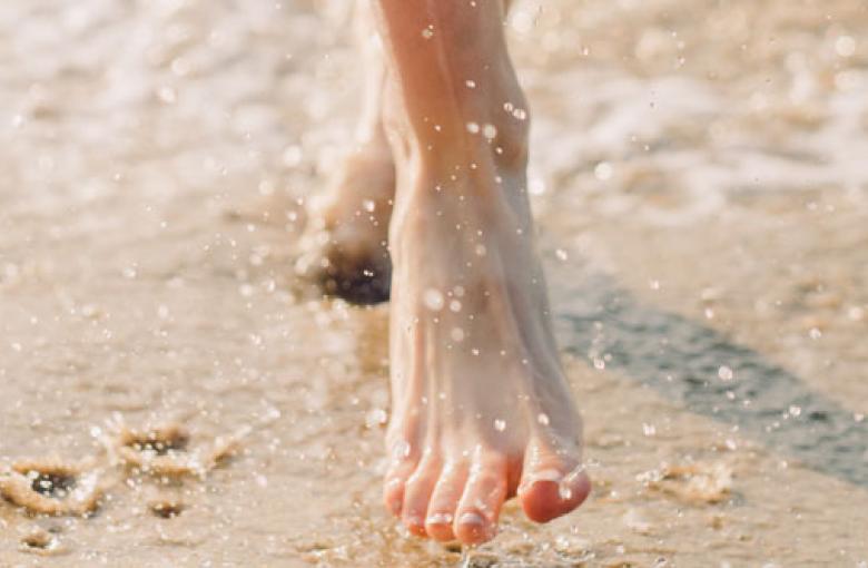 sinking sand walking on beach