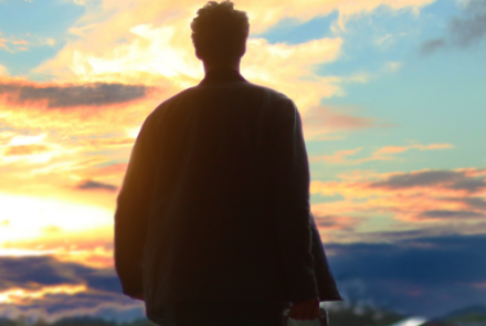 man leaving with suitcase